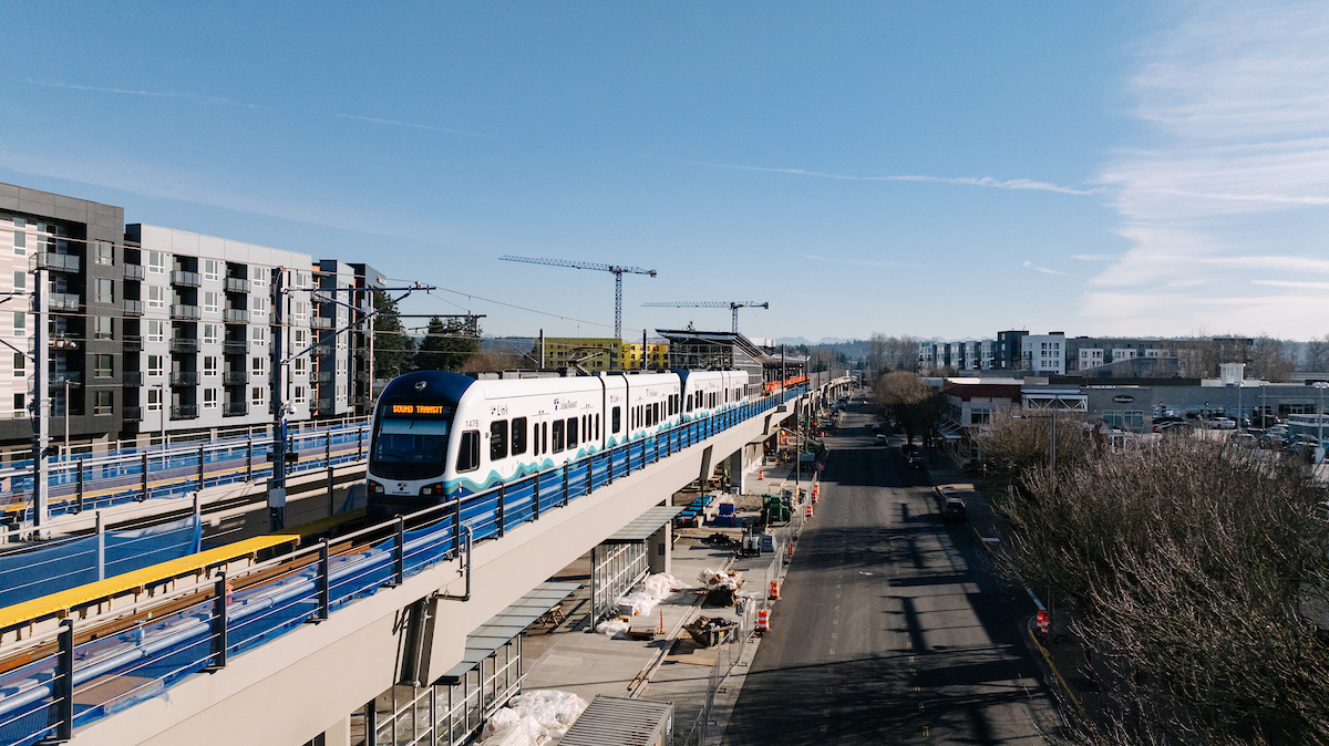 A Link light rail train moves through Downtown Redmond during testing.