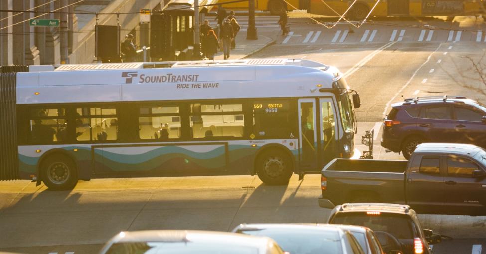 A Sound Transit bus travels through downtown Seattle