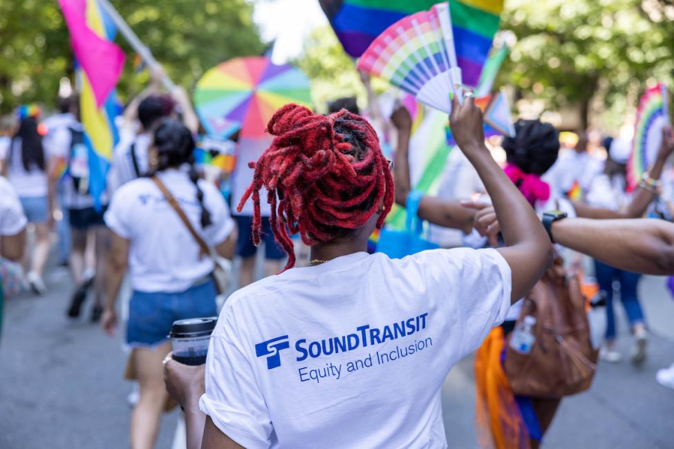 Sound Transit team member walking in Seattle Pride Parade