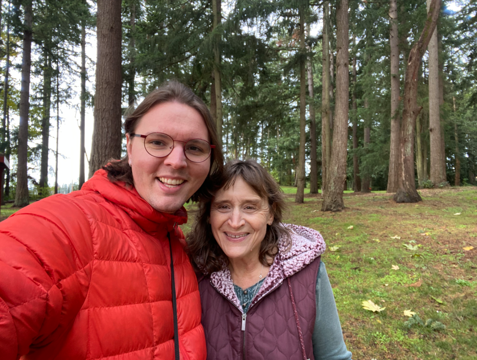 A selfie of Sound Transit employee Seth Daphne and their mom in a park