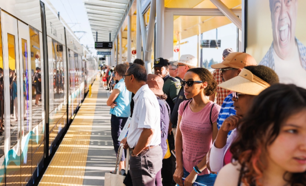 Passengers wait aboard a crowded platform along the Lynnwood Link extension.