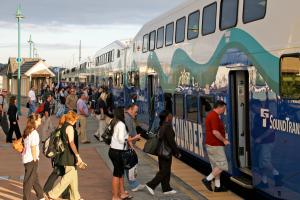 Passengers board the Sounder train at the Puyallup Station.