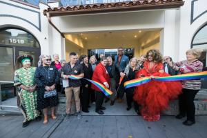 Community members gathered at a ribbon cutting for Pride Place.